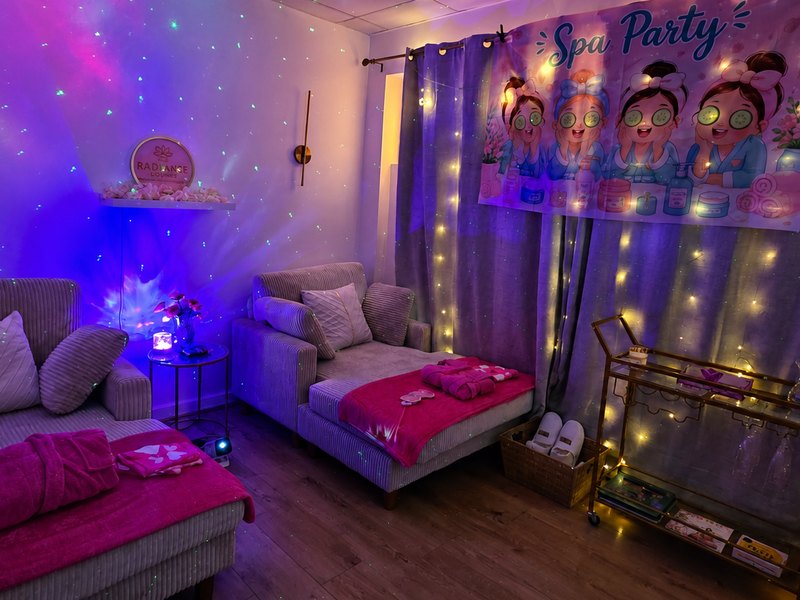 The princess spa party room with castle projection and fairy lights