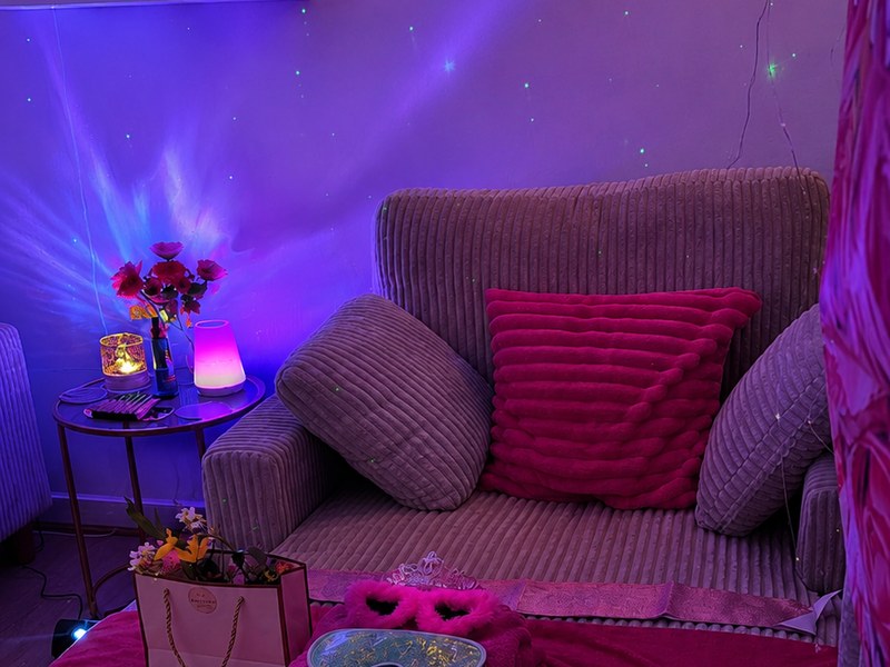 A teen birthday spa set-up with star projection
